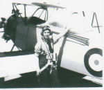 Photo of Charles Emile Leblanc&ndash; Emile preparing for flight.